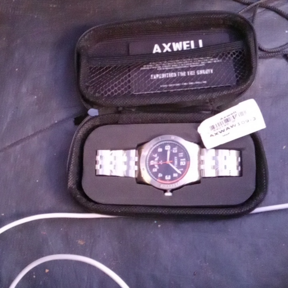 Brand New Axwell Orange and blue stainless steel and chrome w/cert.of Warranty.